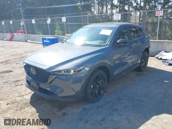 2023 Mazda CX-5 2.5 S Carbon Edition with VIN JM3KFBCM8P0134757, listed as a IAAI auction lot 41893648 with 9,587 mi miles. Bid and sale history available at carsss.com. Image 18.