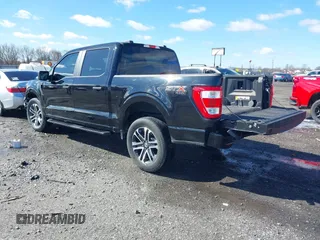 2023 Ford F-150 XL with VIN 1FTFW1E5XPKD67683, listed as a IAAI auction lot 41601078 with 32,433 mi miles. Bid and sale history available at carsss.com. Image 3.