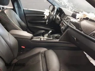 2018 BMW 3 Series 330i xDrive with VIN WBA8D9G51JNU72738, listed as a IAAI auction lot 41978561 with 71,219 mi miles. Bid and sale history available at carsss.com. Image 5.