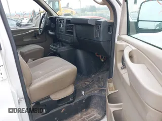 2014 Chevrolet Express Cargo Van with VIN 1GCWGFCA2E1148147, listed as a IAAI auction lot 41101132 with 110,648 mi miles. Bid and sale history available at carsss.com. Image 5.