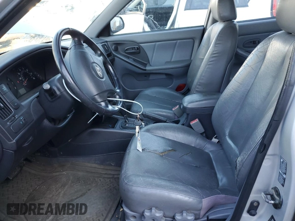 2006 Hyundai Elantra GLS z VIN KMHDN56D96U189271, wystawiony jako Copart lot #46472245 z przebiegiem 139 094 mil mil oraz Szkoda całkowita • Salvage title. Historia ofert i sprzedaży dostępna na DreamBid. Obrazek 7.