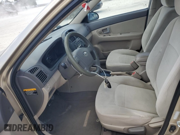 2009 Kia Spectra EX with VIN KNAFE221195600794, listed as a Copart auction lot 68090154 with 77,037 mi miles and Salvage Title. Bid and sale history available at carsss.com. Image 7.