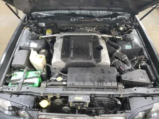 1997 Nissan Maxima with VIN HBY33200347, listed as a Copart auction lot 47182085 with 173,662 mi miles and Salvage title. Bid and sale history available at DreamBid. Image 11.