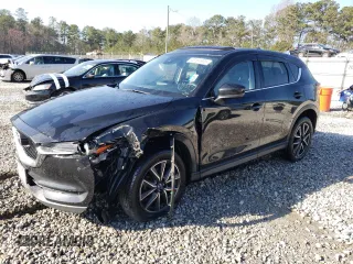 2017 Mazda CX-5 Grand Touring with VIN JM3KFBDL4H0209770, listed as a Copart auction lot 48181935 with 39,128 mi miles and Salvage Title. Bid and sale history available at carsss.com. Image 1.