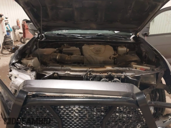 2019 Toyota Tacoma SR with VIN 5TFCZ5AN7KX208672, listed as a IAAI auction lot 42143071 with 83,584 mi miles and . Bid and sale history available at DreamBid. Image 10.