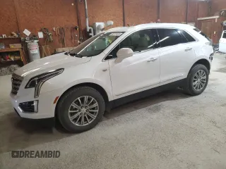 2019 Cadillac XT5 Luxury AWD with VIN 1GYKNDRS8KZ239357, listed as a Copart auction lot 59775125 with 58,074 mi miles and Salvage title. Bid and sale history available at DreamBid. Image 1.