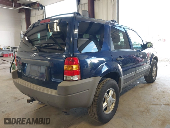 2002 Ford Escape XLT with VIN 1FMCU031X2KA37050, listed as a IAAI auction lot 42024674 with 199,249 mi miles and . Bid and sale history available at DreamBid. Image 4.