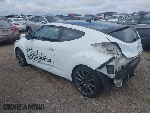 2013 Hyundai Veloster w/Gray Int z VIN KMHTC6AD3DU131703, wystawiony jako IAAI lot #42468831 z przebiegiem 188 513 mil mil oraz . Historia ofert i sprzedaży dostępna na DreamBid. Obrazek 3.