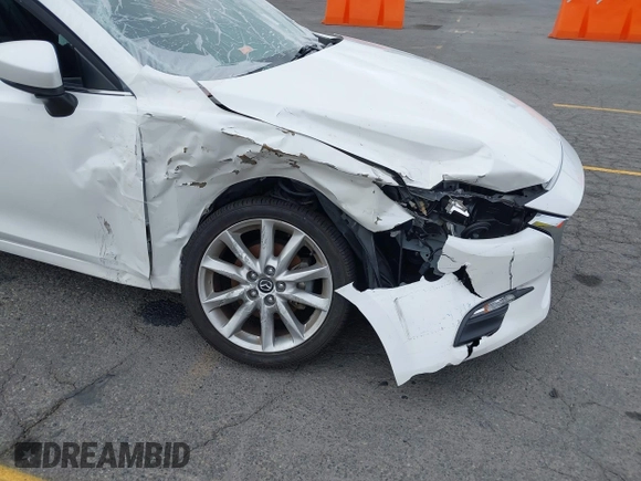 2017 Mazda 3 Touring with VIN 3MZBN1V72HM121902, listed as a IAAI auction lot 39193644 with 40,113 mi miles and . Bid and sale history available at DreamBid. Image 6.