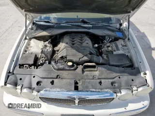 2006 Jaguar XJ Vanden Plas with VIN SAJWA82B16SH06996, listed as a Copart auction lot 62509025 with 80,236 mi miles and Salvage title. Bid and sale history available at DreamBid. Image 11.