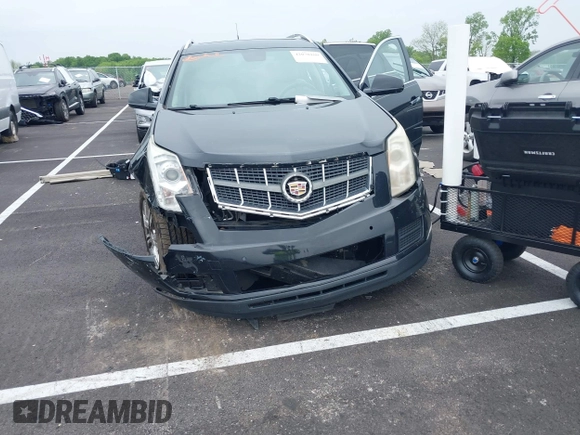 2010 Cadillac SRX Luxury Collection z VIN 3GYFNDEY1AS642703, wystawiony jako IAAI lot #42078160 z przebiegiem 172 168 mil mil oraz . Historia ofert i sprzedaży dostępna na DreamBid. Obrazek 6.