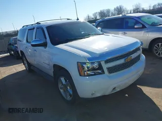 2012 Chevrolet Suburban LT with VIN 1GNSKJE73CR126813, listed as a IAAI auction lot 41692659 with 254,895 mi miles. Bid and sale history available at carsss.com. Image 1.