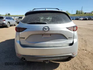 2019 Mazda CX-5 Grand Touring with VIN JM3KFADM6K0543888, listed as a Copart auction lot 56310785 with 112,737 mi miles and Salvage title. Bid and sale history available at DreamBid. Image 6.