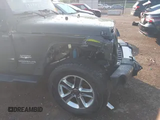 2015 Jeep Wrangler Unlimited Altitude с VIN 1C4HJWEG7FL584395, выставлен на аукционе IAAI как лот 42399987 с пробегом 142 906 миль миль и . История ставок и продаж доступна на DreamBid. Изображение 6.