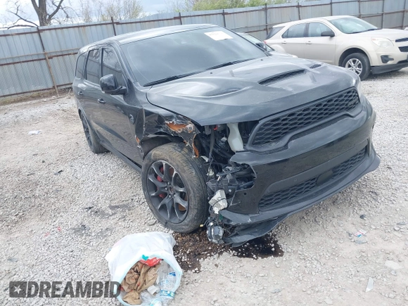 2021 Dodge Durango SRT Hellcat with VIN 1C4SDJH91MC682235, listed as a IAAI auction lot 42029380 with 9,921 mi miles and . Bid and sale history available at DreamBid. Image 1.