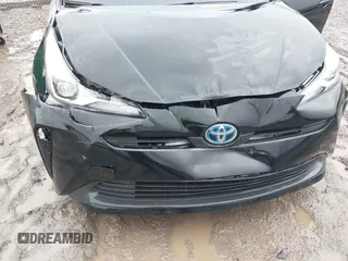 2021 Toyota Prius L Eco with VIN JTDKAMFU5M3145210, listed as a IAAI auction lot 41482234 with 85,600 mi miles and . Bid and sale history available at DreamBid. Image 6.