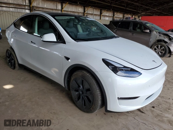 2024 Tesla Model Y Long Range with VIN 7SAYGDEE1RF165311, listed as a Copart auction lot 51711665 with 15,190 mi miles and Salvage Title. Bid and sale history available at DreamBid. Image 4.