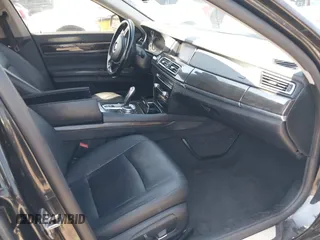 2015 BMW 7 Series 740Li with VIN WBAYE4C57FD138961, listed as a IAAI auction lot 42216122 with 224,740 mi miles and . Bid and sale history available at carsss.com. Image 5.