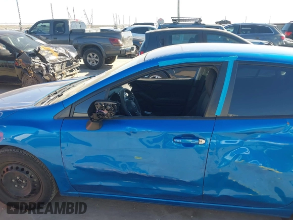 2023 Subaru Impreza with VIN 4S3GTAB68P3702475, listed as a IAAI auction lot 41206655 with 30,571 mi miles and . Bid and sale history available at DreamBid. Image 14.