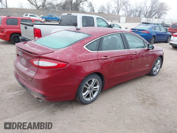 2016 Ford Fusion Titanium Hybrid with VIN 3FA6P0RU3GR355398, listed as a IAAI auction lot 41140669 with 125,959 mi miles. Bid and sale history available at carsss.com. Image 4.