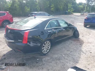 2014 Cadillac ATS Luxury AWD z VIN 1G6AH5RX1E0164796, wystawiony jako IAAI lot #42211010 z przebiegiem 167 079 mil mil oraz . Historia ofert i sprzedaży dostępna na DreamBid. Obrazek 4.