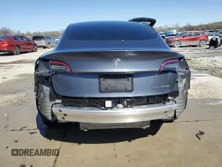 2020 Tesla Model 3 Long Range with VIN 5YJ3E1EBXLF668795, listed as a Copart auction lot 49913515 with 82,962 mi miles and Salvage Title. Bid and sale history available at DreamBid. Image 6.