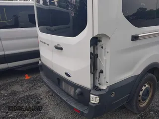 2018 Ford Transit Passenger XL with VIN 1FBAX2CMXJKB46104, listed as a IAAI auction lot 42263406 with Not provided miles and . Bid and sale history available at DreamBid. Image 17.