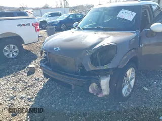 2014 MINI Countryman S with VIN WMWZC3C5XEWP52054, listed as a IAAI auction lot 41452354 with 104,873 mi miles and . Bid and sale history available at DreamBid. Image 6.