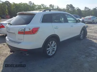 2011 Mazda CX-9 Grand Touring with VIN JM3TB2DA4B0305811, listed as a IAAI auction lot 42092829 with 232,298 mi miles and . Bid and sale history available at DreamBid. Image 4.