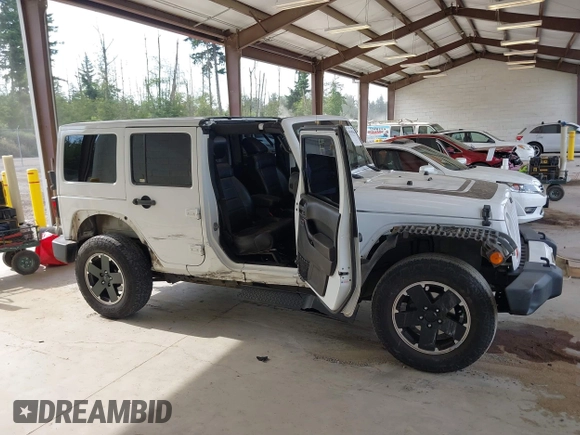 2012 Jeep Wrangler Unlimited Sahara with VIN 1C4BJWEG7CL275883, listed as a IAAI auction lot 42510764 with 149,531 mi miles and . Bid and sale history available at DreamBid. Image 14.