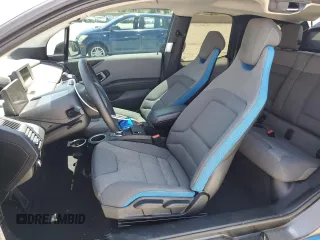 2017 BMW i3 with VIN WBY1Z8C51HV889551, listed as a Copart auction lot 57327875 with 65,437 mi miles and Salvage title. Bid and sale history available at DreamBid. Image 7.