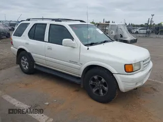1998 Isuzu Rodeo S z VIN 4S2CM58W0W4331738, wystawiony jako IAAI lot #42074562 z przebiegiem 237 684 mil mil oraz . Historia ofert i sprzedaży dostępna na DreamBid. Obrazek 1.