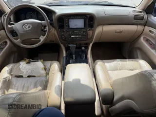 2002 Toyota Land Cruiser z VIN JTEHT05J622022972, wystawiony jako Copart lot #59201475 z przebiegiem 299 548 mil mil oraz Czysty tytuł • Clean title. Historia ofert i sprzedaży dostępna na DreamBid. Obrazek 9.