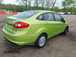 2013 Ford Fiesta SE z VIN 3FADP4BJ9DM184289, wystawiony jako IAAI lot #42110578 z przebiegiem 166 764 mil mil oraz . Historia ofert i sprzedaży dostępna na DreamBid. Obrazek 4.