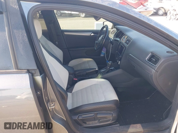 2016 Volkswagen Jetta Sport z VIN 3VWD17AJ0GM386504, wystawiony jako IAAI lot #42000125 z przebiegiem 90 405 mil mil oraz . Historia ofert i sprzedaży dostępna na DreamBid. Obrazek 5.