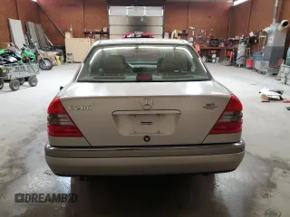 1995 Mercedes-Benz C with VIN WDBHA28E8SF115598, listed as a Copart auction lot 50145195 with 129,134 mi miles and Clean Title. Bid and sale history available at carsss.com. Image 6.