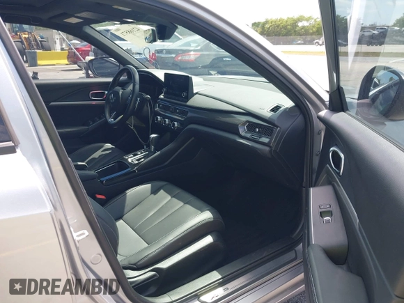 2023 Acura Integra w/A-Spec Package with VIN 19UDE4H39PA009519, listed as a IAAI auction lot 42168571 with 14,661 mi miles and . Bid and sale history available at DreamBid. Image 5.