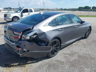 2022 Honda Accord Touring with VIN 1HGCV3F91NA031010, listed as a IAAI auction lot 40302407 with 18,820 mi miles and . Bid and sale history available at DreamBid. Image 4.