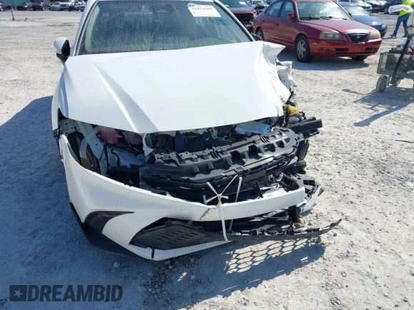 2025 Toyota Camry LE with VIN 4T1DAACK0SU551828, listed as a IAAI auction lot 41823385 with Not Provided miles and . Bid and sale history available at DreamBid. Image 19.