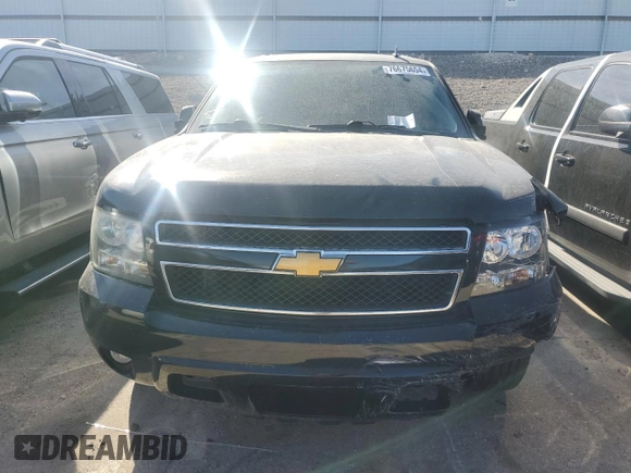 2014 Chevrolet Suburban LT with VIN 1GNSKJE71ER227075, listed as a Copart auction lot 76675654 with 214,113 mi miles and Salvage Title. Bid and sale history available at DreamBid. Image 5.