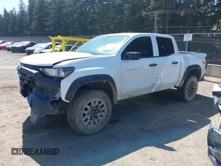 2023 Chevrolet Colorado 4WD Trail Boss with VIN 1GCPTEEK2P1203392, listed as a IAAI auction lot 42043211 with 27,589 mi miles. Bid and sale history available at carsss.com. Image 2.