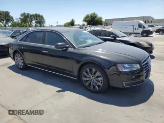 2016 Audi A8 3.0T with VIN WAU34AFD8GN004633, listed as a Copart auction lot 61692955 with 155,405 mi miles and Salvage title. Bid and sale history available at DreamBid. Image 4.