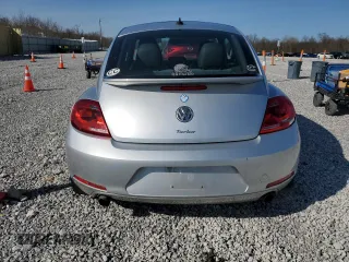 2012 Volkswagen Beetle 2.0T Turbo w/Sun/Snd/Nav PZEV with VIN 3VWVA7AT6CM662796, listed as a Copart auction lot 51649775 with 61,785 mi miles and Clean Title. Bid and sale history available at carsss.com. Image 6.