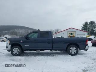 2021 Ram 2500 Tradesman with VIN 3C6UR5HL5MG671238, listed as a IAAI auction lot 41404738 with 60,658 mi miles and . Bid and sale history available at DreamBid. Image 14.
