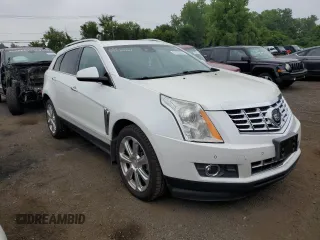 2015 Cadillac SRX Premium Collection with VIN 3GYFNGE32FS528514, listed as a Copart auction lot 61222534 with 104,433 mi miles and Salvage Title. Bid and sale history available at carsss.com. Image 4.