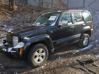 2012 Jeep Liberty Sport with VIN 1C4PJMAK0CW209498, listed as a IAAI auction lot 41881406 with 127,855 mi miles. Bid and sale history available at carsss.com. Image 2.