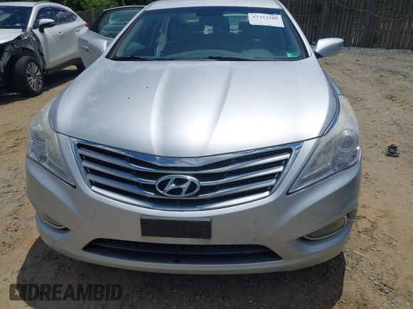 2014 Hyundai Azera Limited z VIN KMHFH4JG9EA397338, wystawiony jako IAAI lot #42352208 z przebiegiem 90 253 mil mil oraz . Historia ofert i sprzedaży dostępna na DreamBid. Obrazek 6.