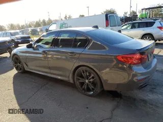 2019 BMW 5 Series M550i xDrive with VIN WBAJB9C55KB288709, listed as a Copart auction lot 46590735 with 58,256 mi miles and Salvage title. Bid and sale history available at DreamBid. Image 2.