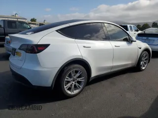 2024 Tesla Model Y Long Range with VIN 7SAYGDEE1RF025842, listed as a Copart auction lot 56226065 with Not provided miles and Non repairable. Bid and sale history available at DreamBid. Image 3.