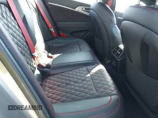 2022 Genesis G70 3.3T z VIN KMTG54TE0NU084191, wystawiony jako IAAI lot #41479649 z przebiegiem 51 548 mil mil oraz . Historia ofert i sprzedaży dostępna na DreamBid. Obrazek 8.